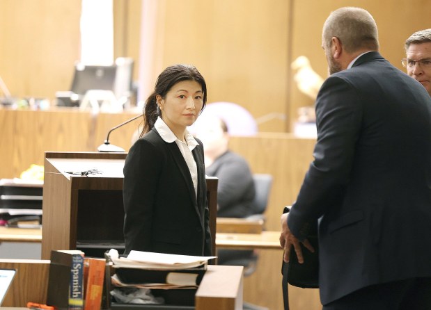 Dr. Yue "Emily" Yu, left, and her attorneys appear before Judge Jonathan Fish in Orange County Superior Court in Santa Ana on April 18, 2023. (Photo by Frederick M. Brown for DailyMail.com/POOL)