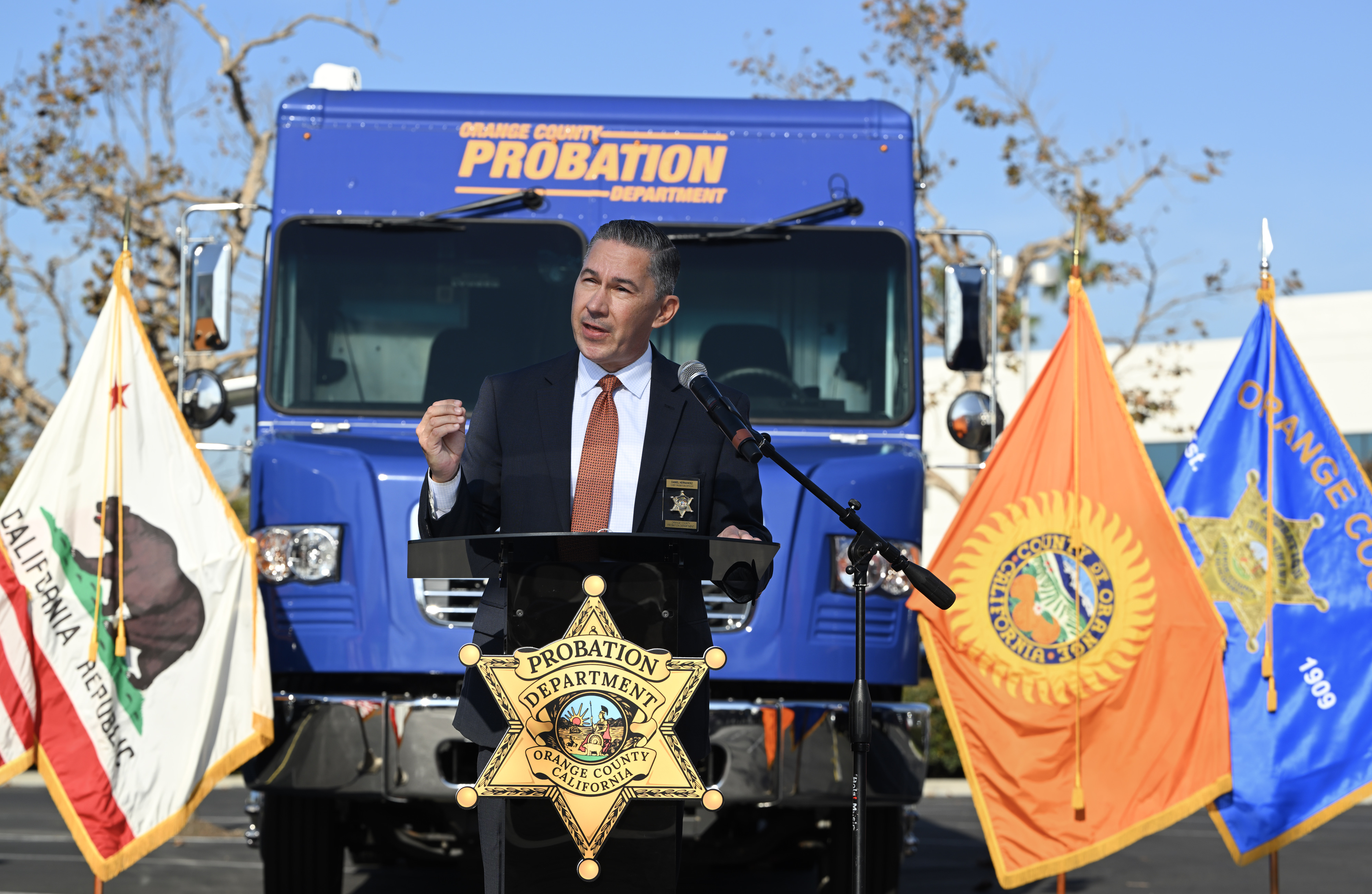 Chief Probation Office for Daniel Hernandez speaks at an event...