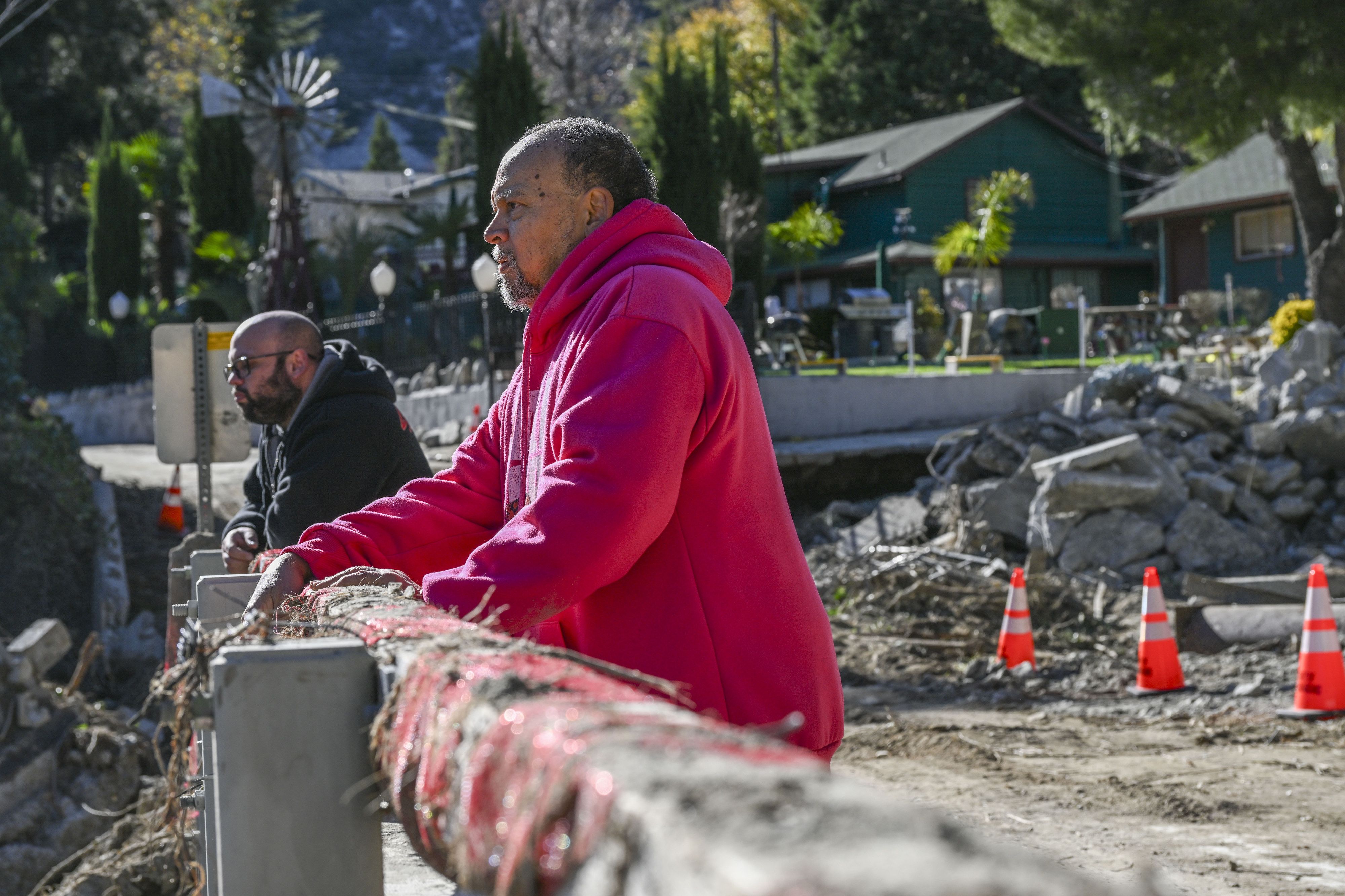 From front, Fernando Ceja and his son, Michael Ceja, residents...