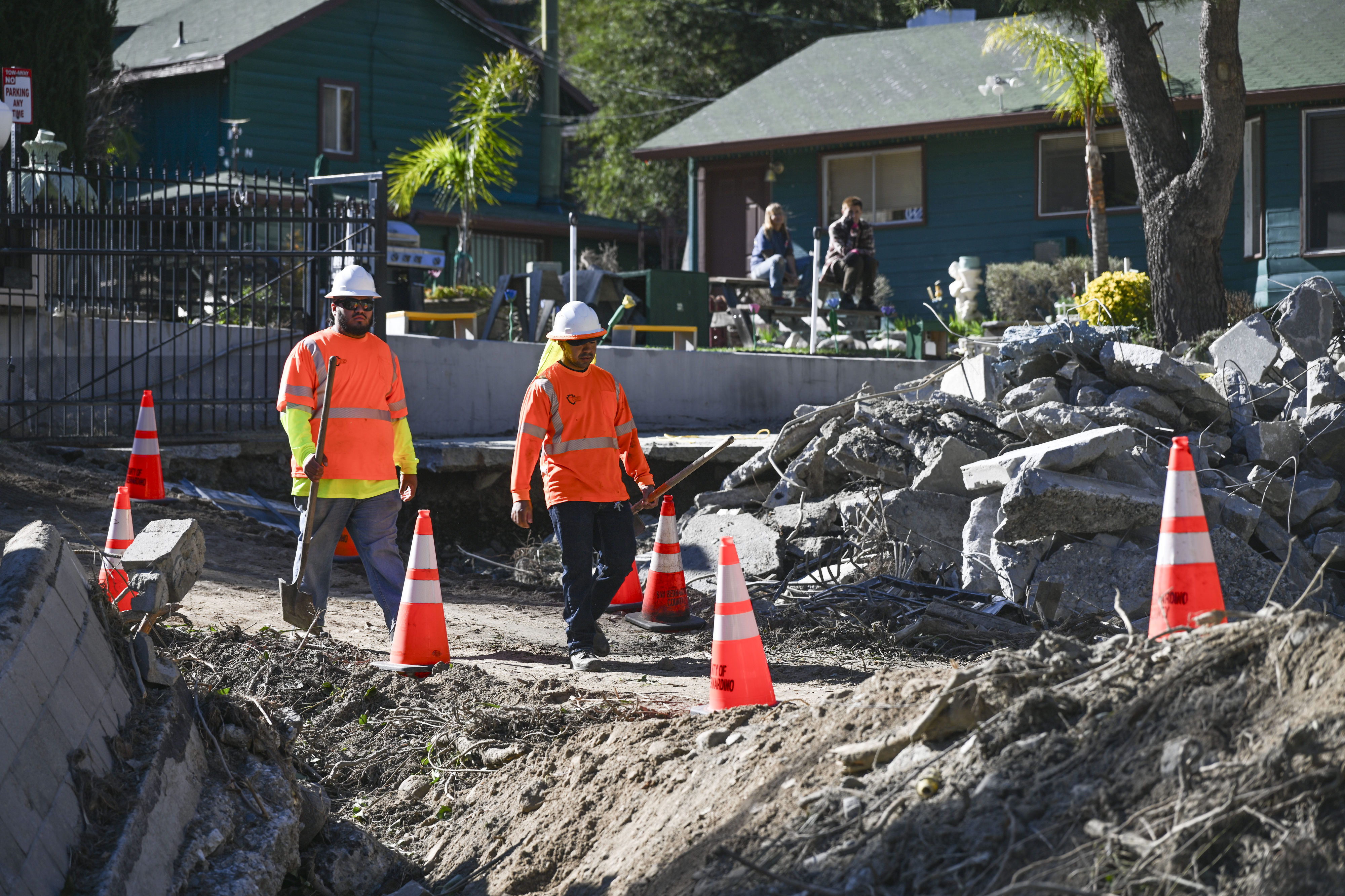 The county works to manage storm damage around the Happy...