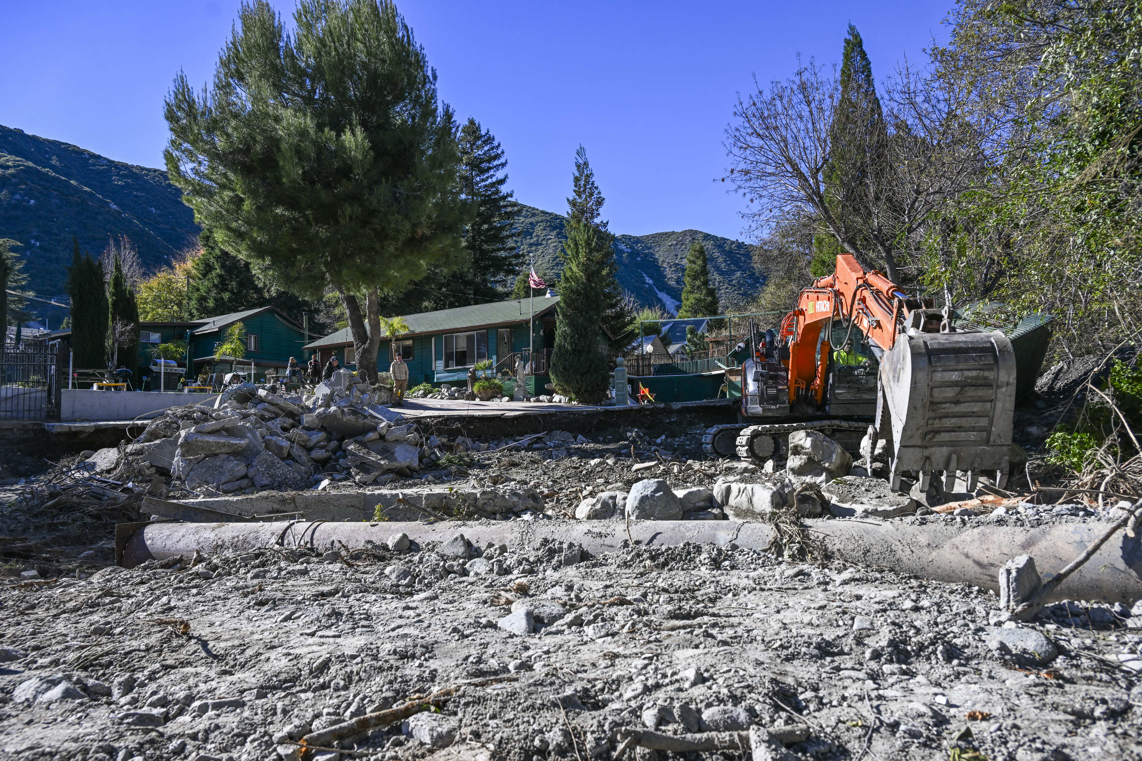 The county works to manage storm damage around the Happy...