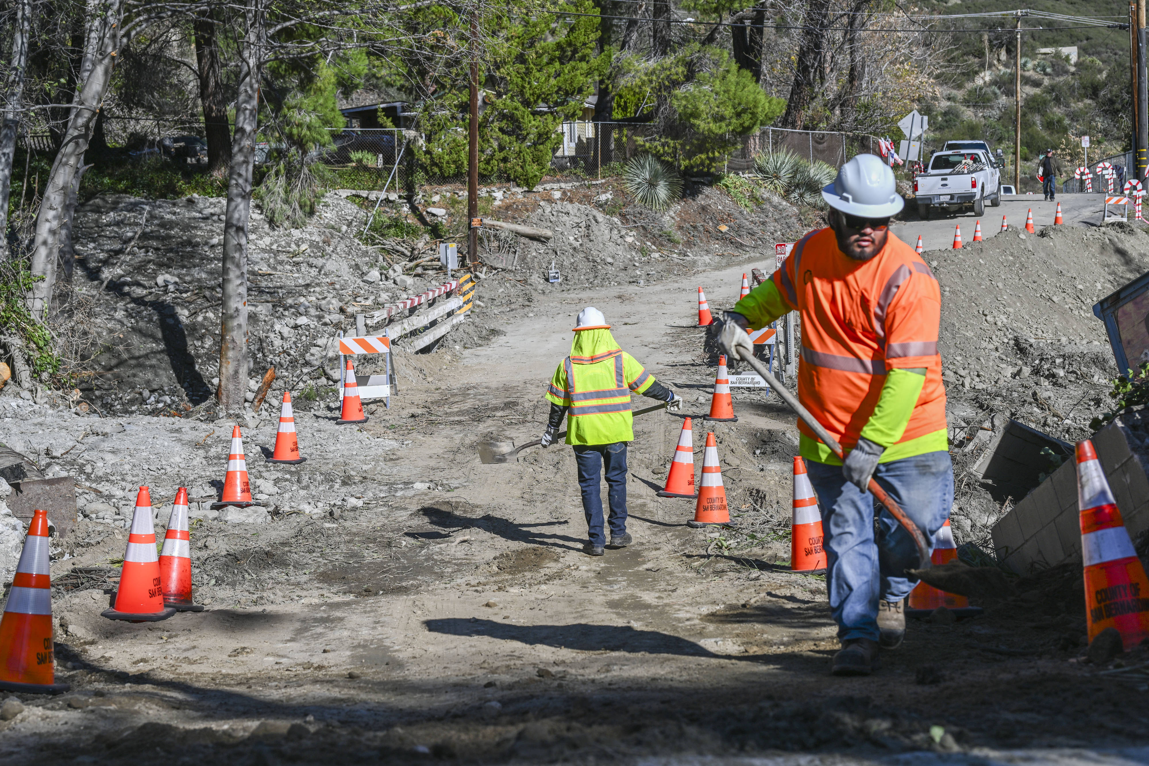The county works to manage storm damage around the Happy...
