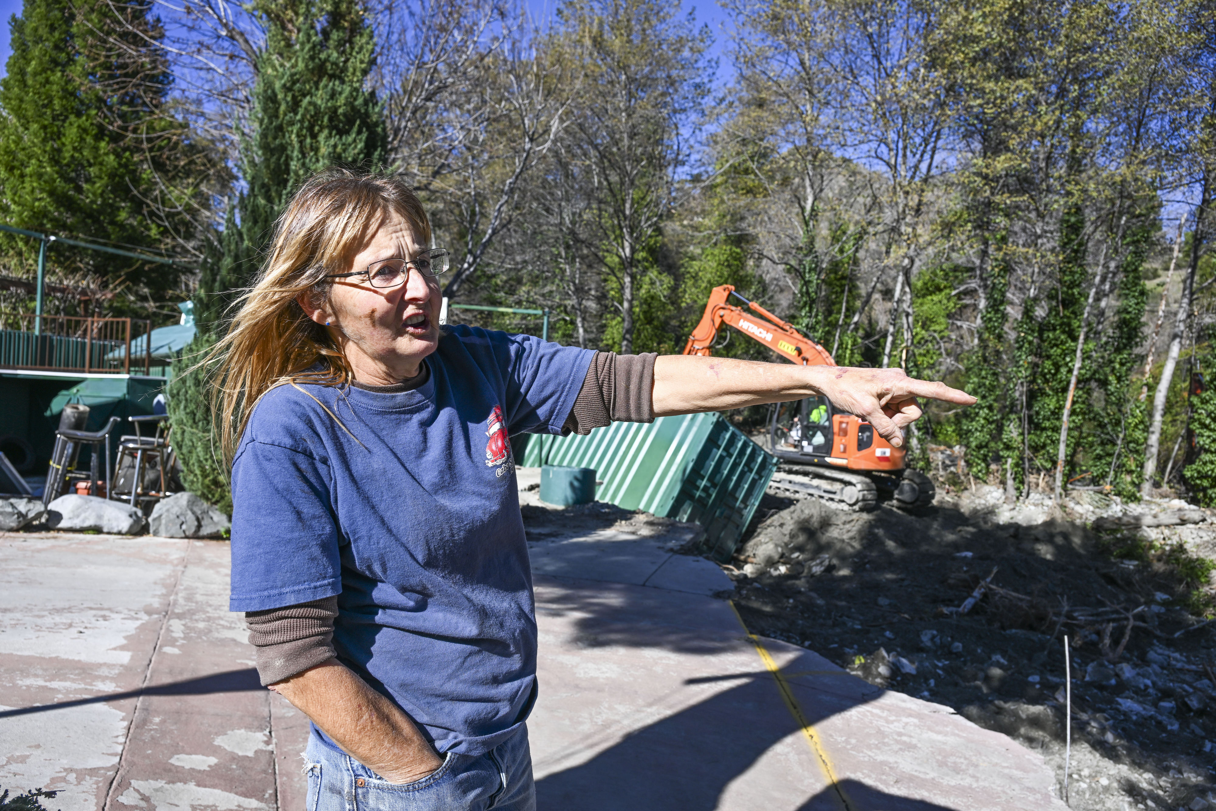 Angie Smith, the property manager of a home damaged by...