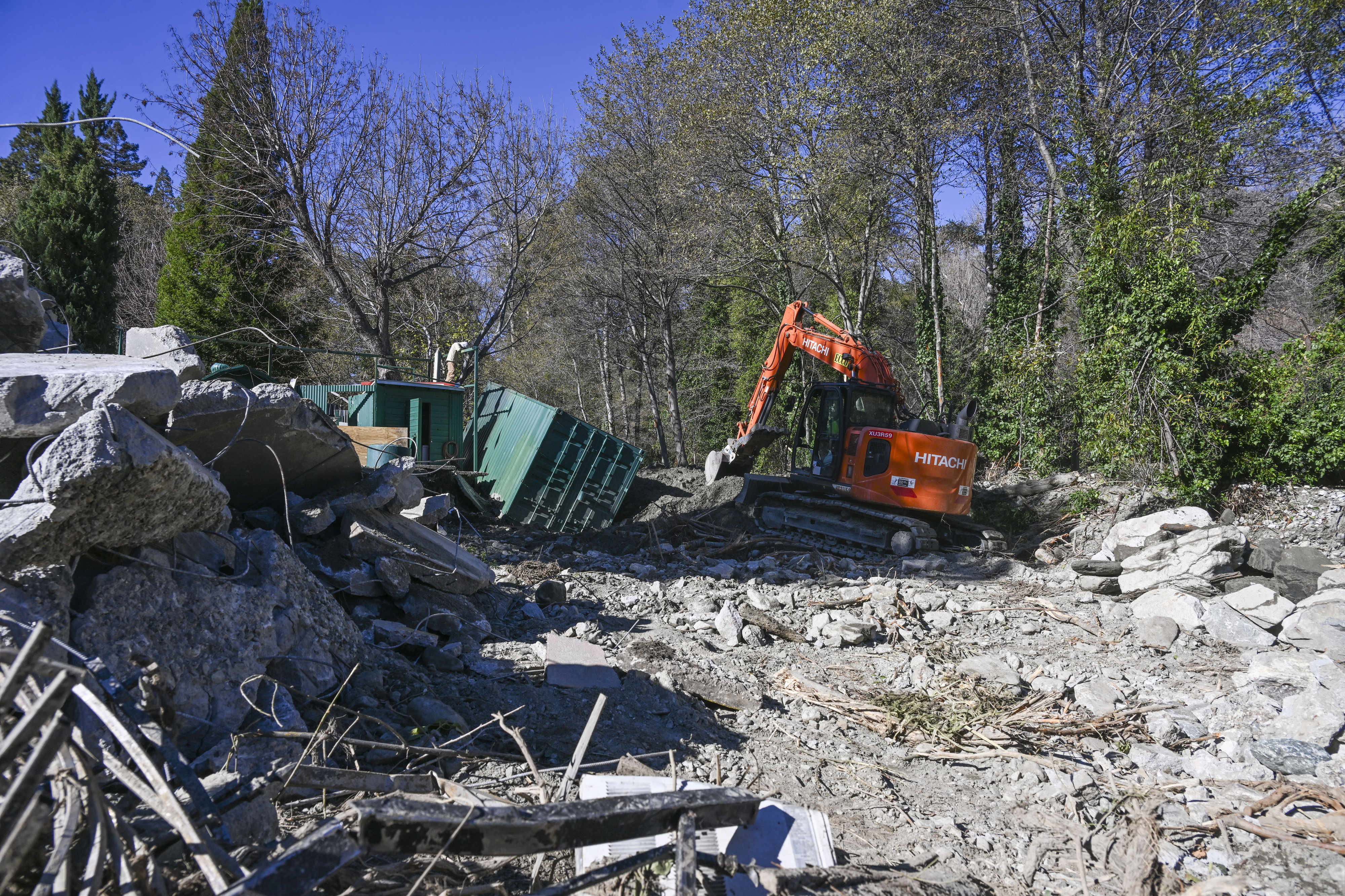 The county works to manage storm damage around the Happy...