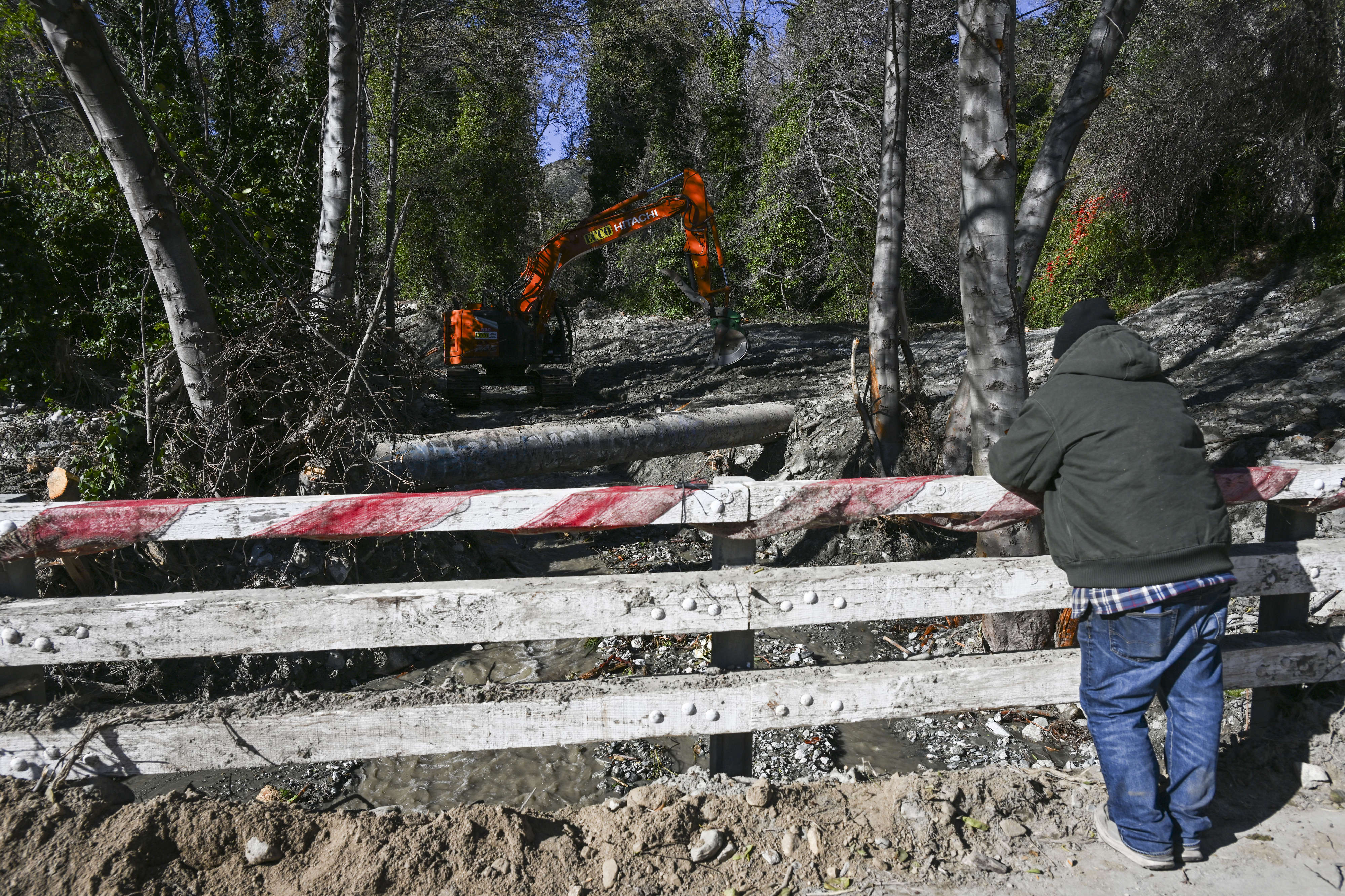 The county works to manage storm damage around the Happy...