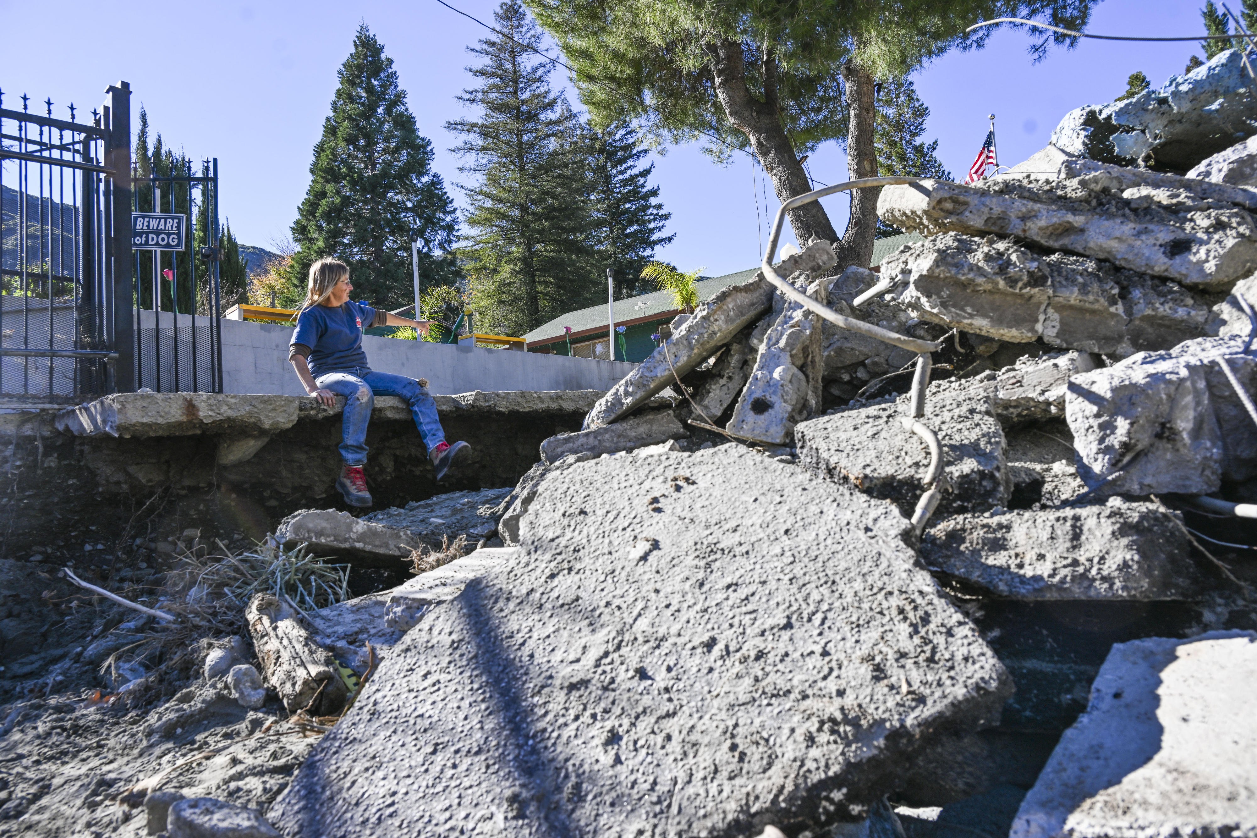 Angie Smith, the property manager of a home damaged by...