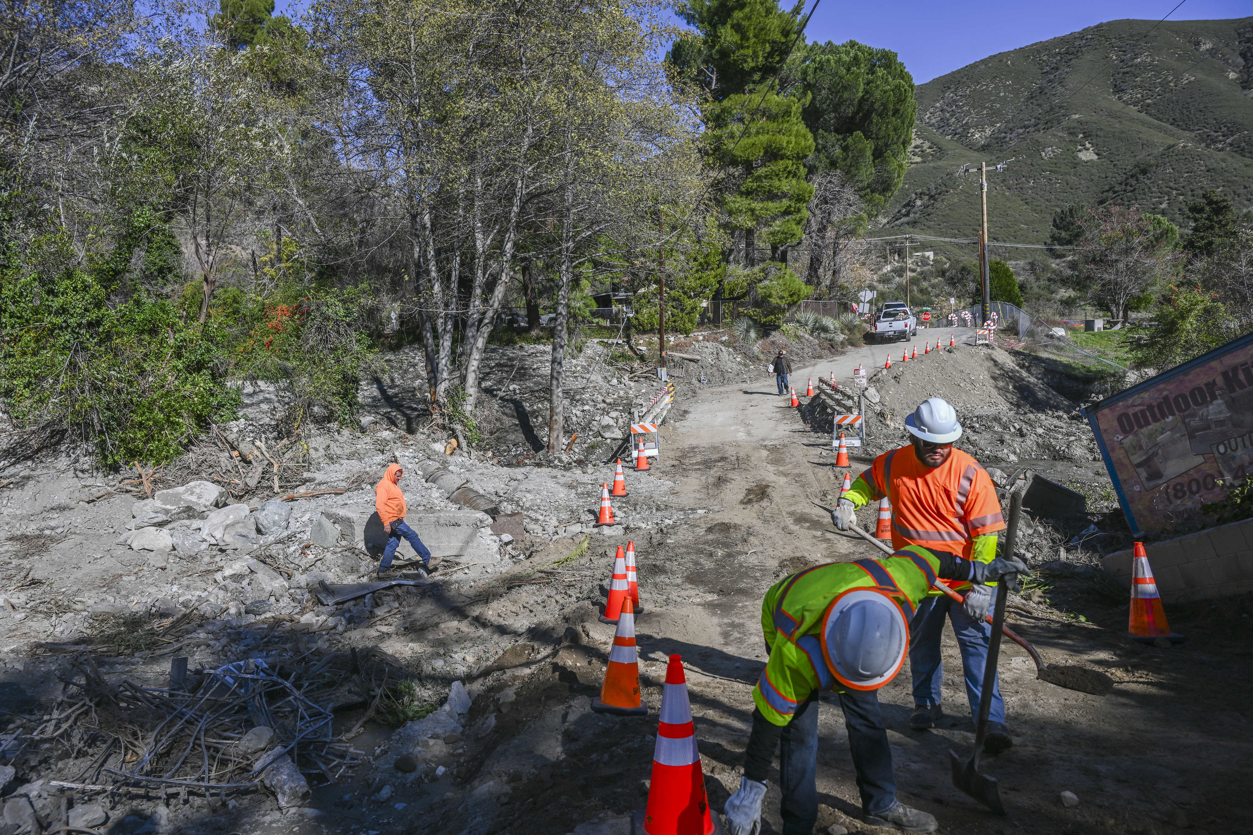 The county works to manage storm damage around the Happy...