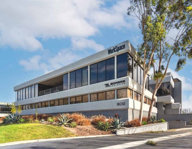 This 26,481-square-foot office building in Irvine sold Dec. 2 for $9.2 million. The two-story building at 18012 Cowan was built in 1985 before being renovated in 2020. (Photo courtesy of NAI Capital Commercial)