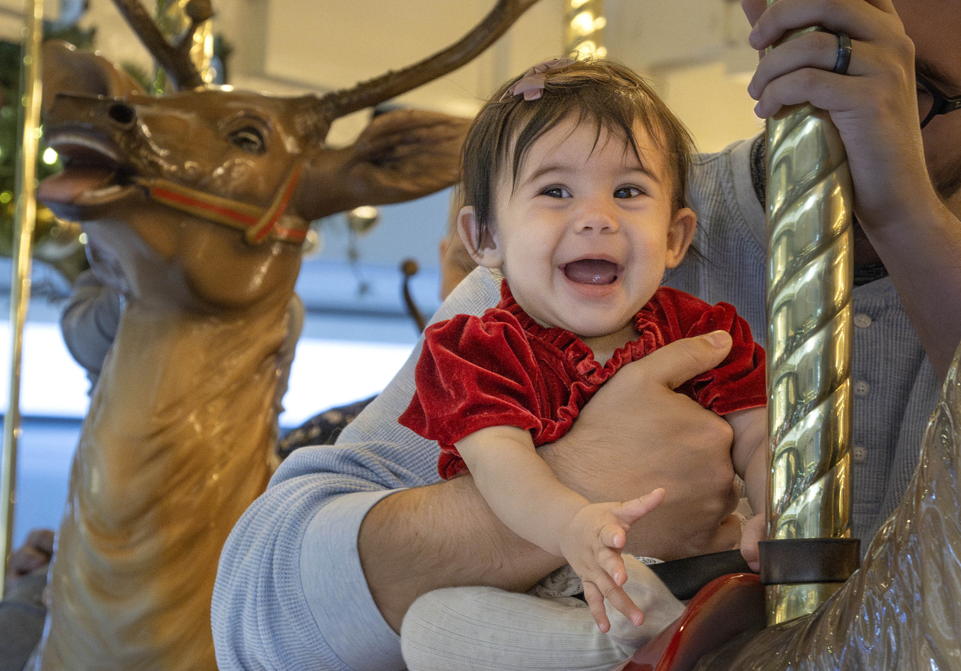 Ryan Grnereux’s 7-months-old daughter, Lila, can’t contain her excitement while...