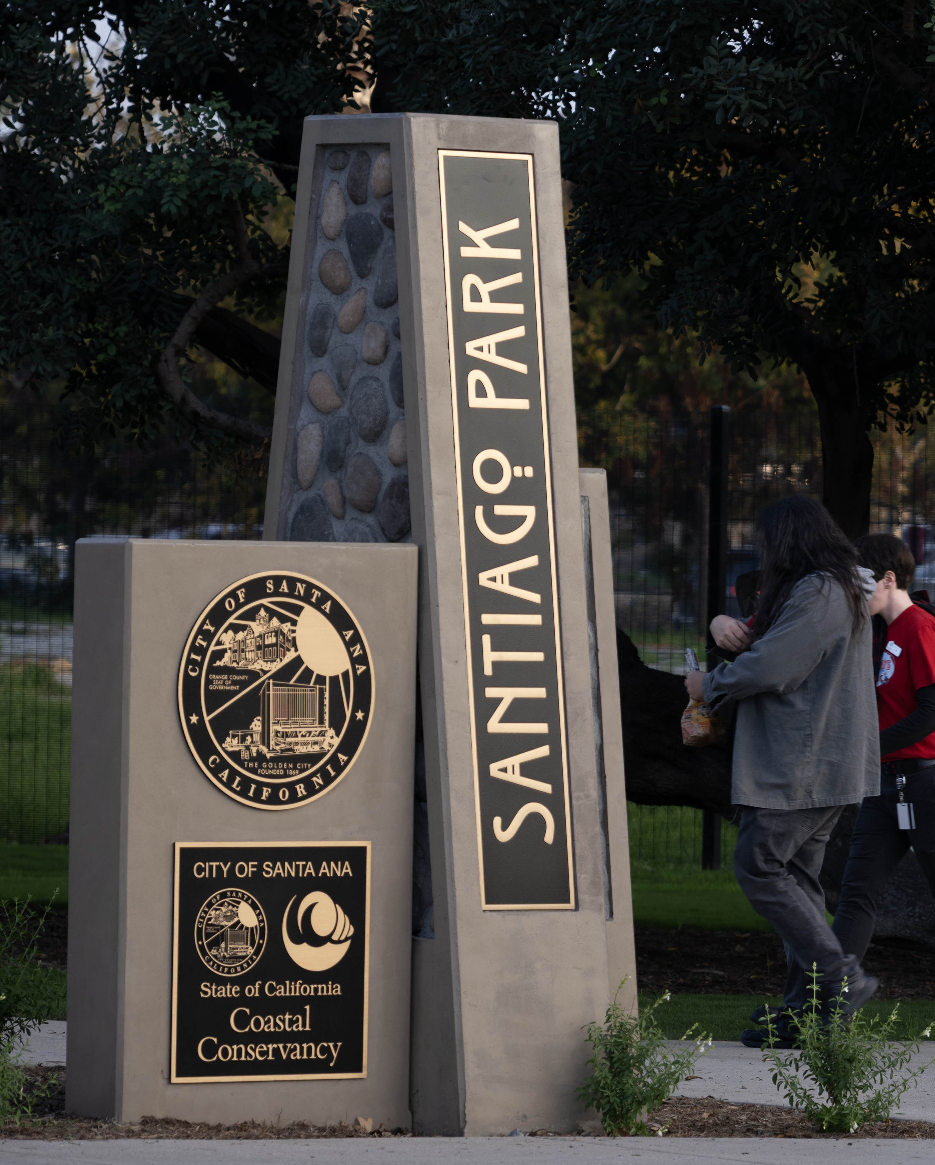 Visitors are welcomed to Santiago Park in Santa Ana with...