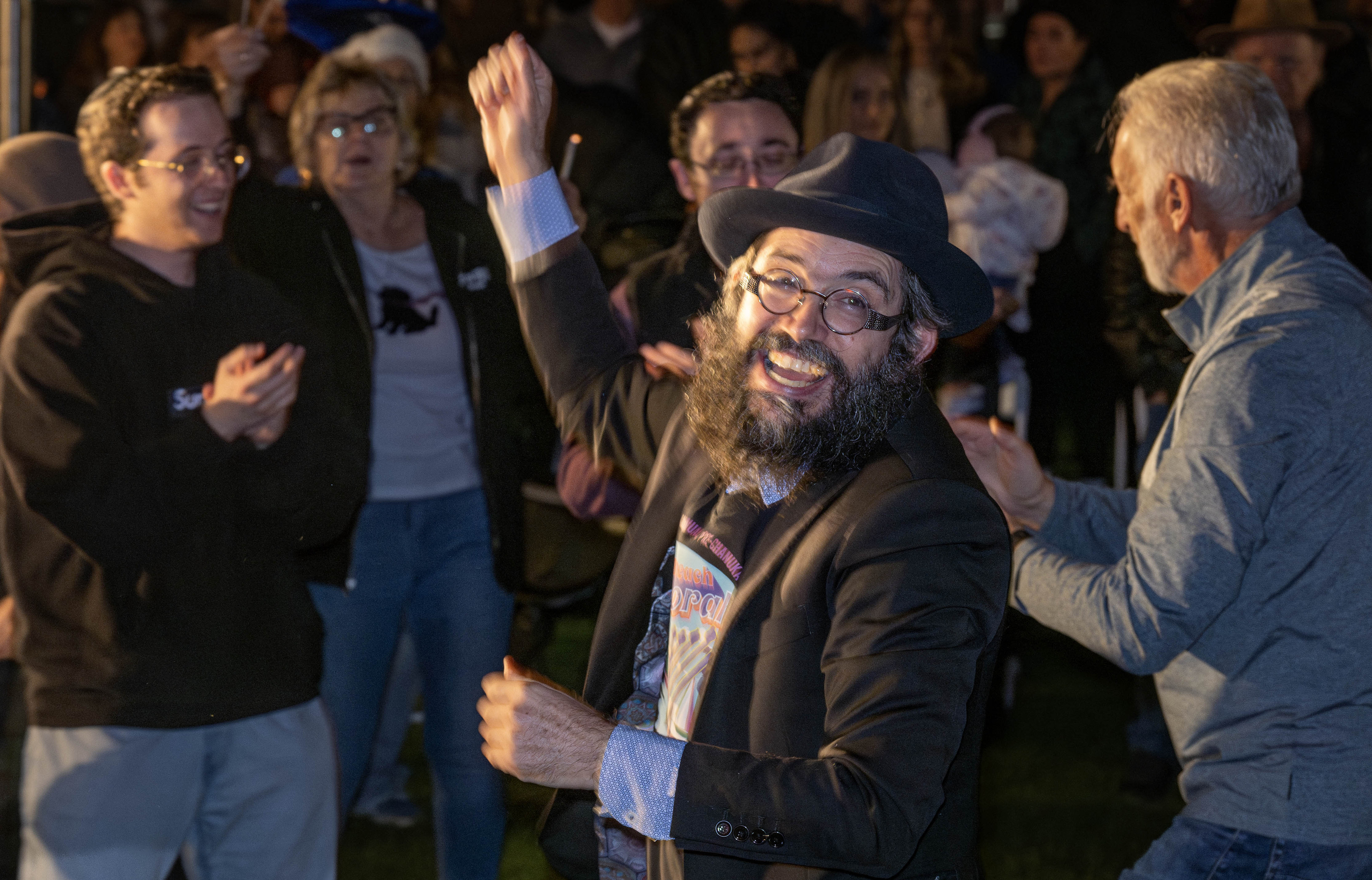 Rabbi Shmuel Marcus hosts the annual pre-Hanukkah Menorah Lighting ceremony...