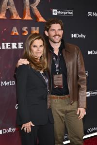 Maria Shriver and Christopher Schwarzenegger at the “Avatar: Fire and Ash” World Premiere held at the Dolby Theatre on December 01, 2025 in Los Angeles, California.