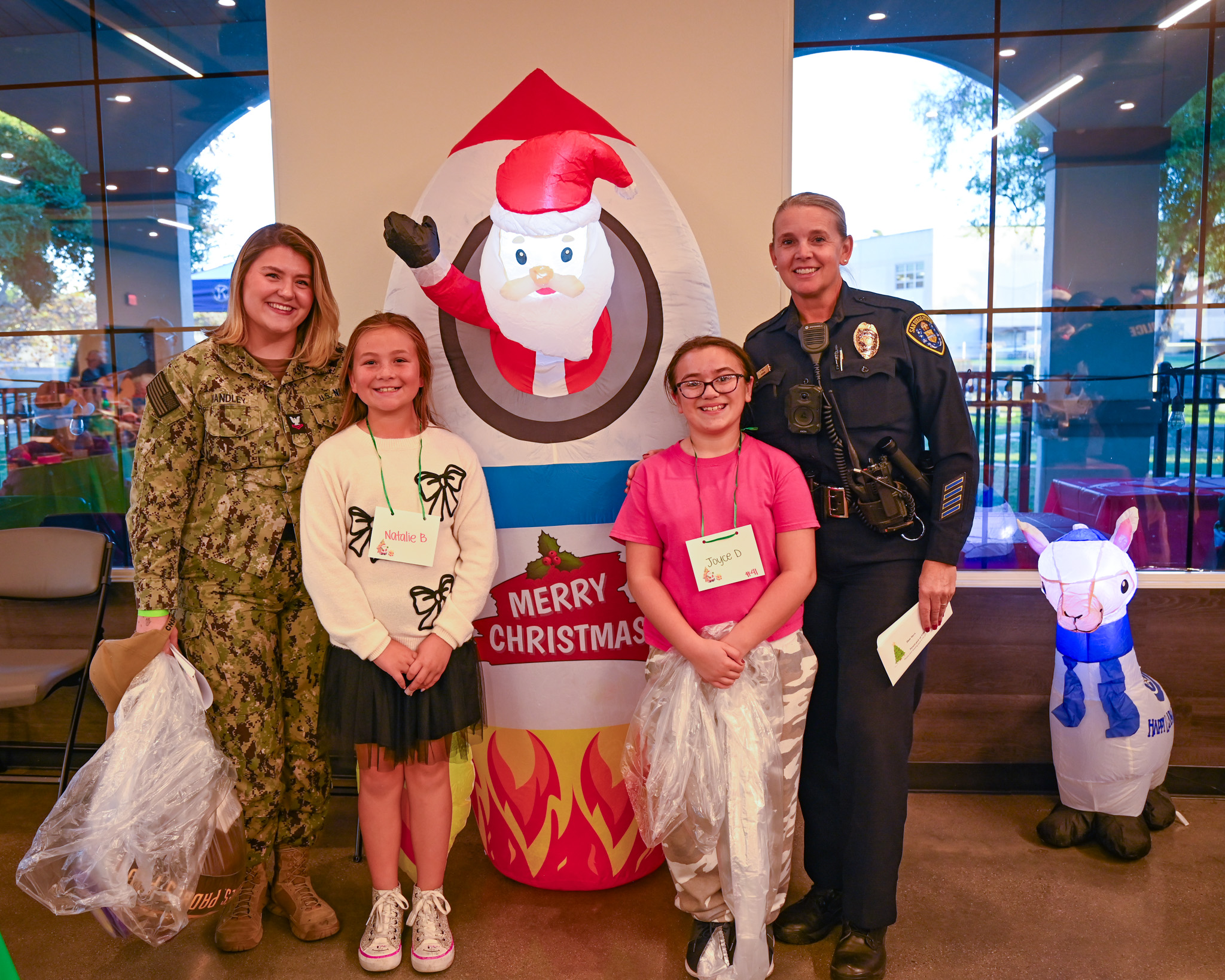 From left, HM2 (Hospital Corpsman Second Class) Krysta Handley with...