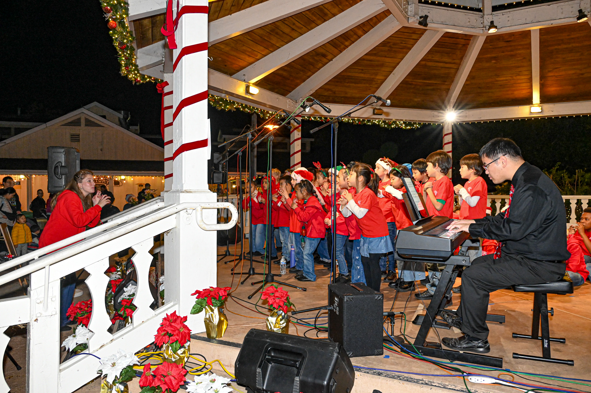 The San Diego Childrenâs Choir performing in the gazebo. (Criselda...