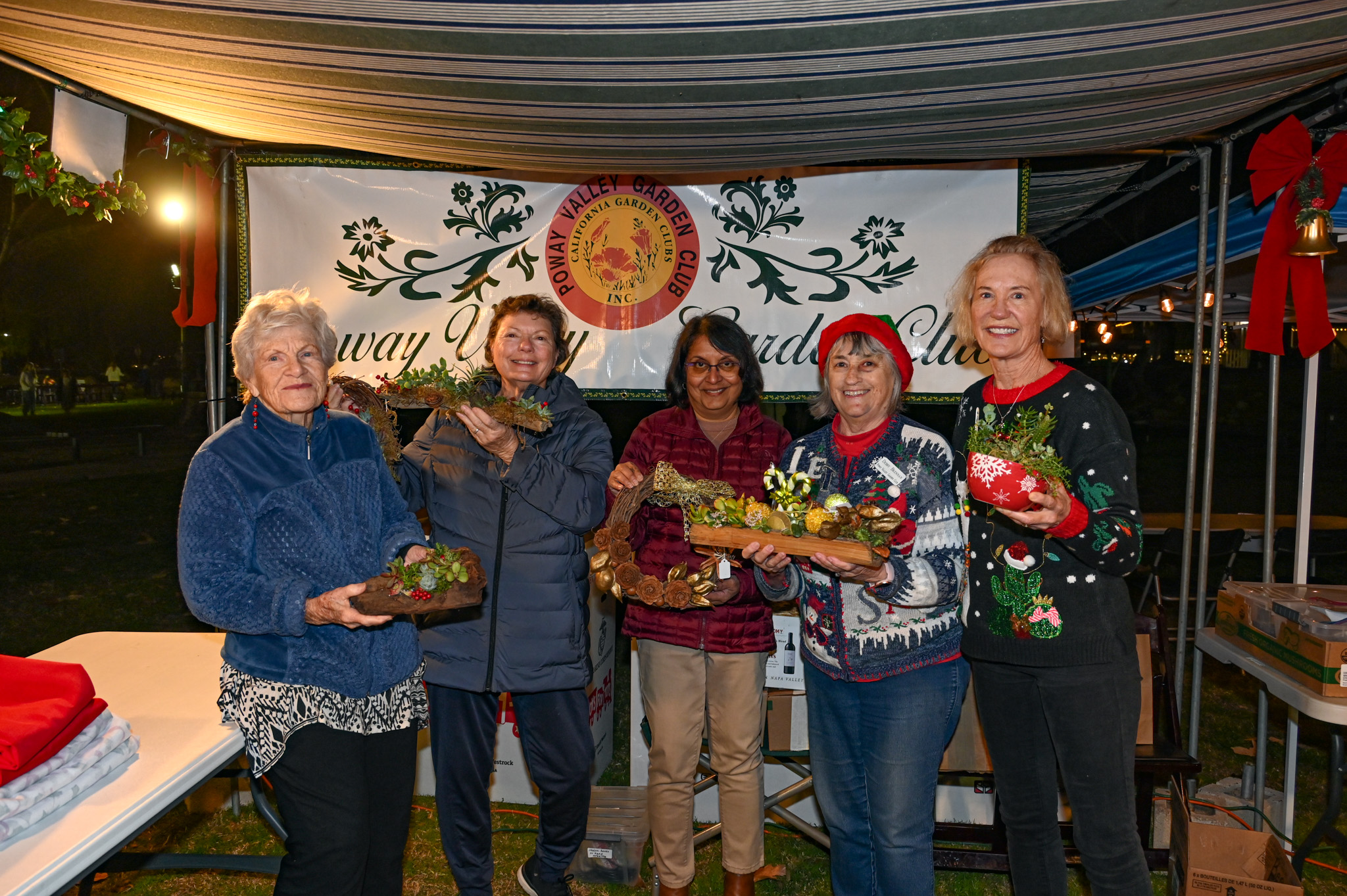 The Poway Valley Garden Club sold handmade holiday wreaths, dish...