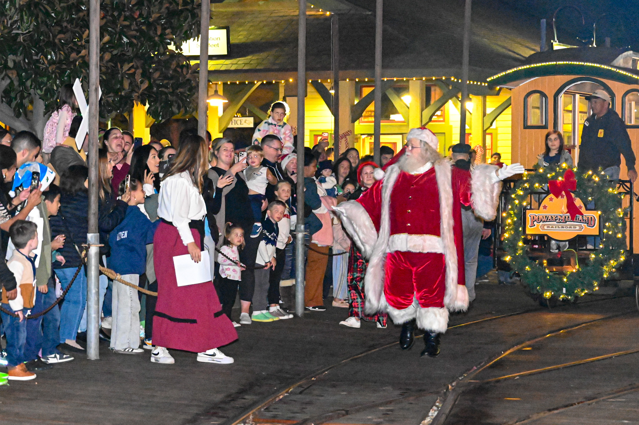 Santa begins his walk from the Old Poway Park Train...