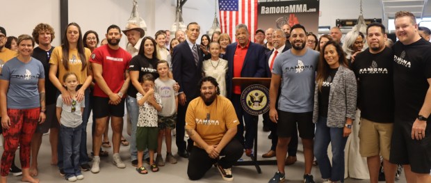 Local and national officials gathered at the Ramona MMA Center on Monday, Aug. 18 to hear U.S. Rep. Darrell Issa announce his bill to have the Ramona Post Office renamed as the Archie Moore Post Office Building. (Courtesy Congressman Darrell Issa)