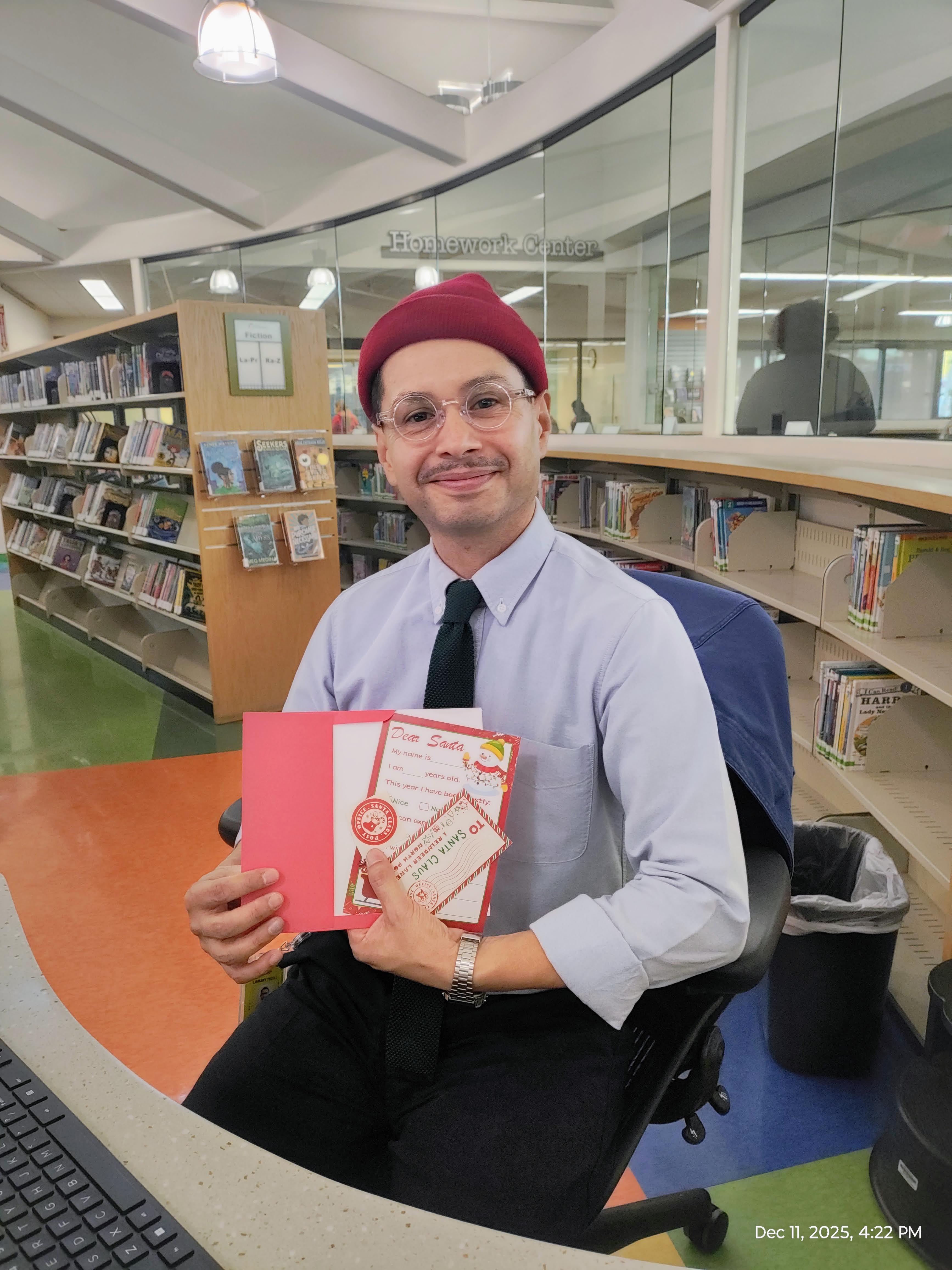 Ivan Soltero, a librarian at the Ramona Community Library, was...