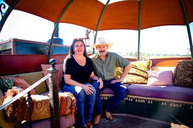 Dawn Sardinas and Wylie Weldy inside the Punkin Project Carriage they designed and own. (Stephanie Ogilvie)