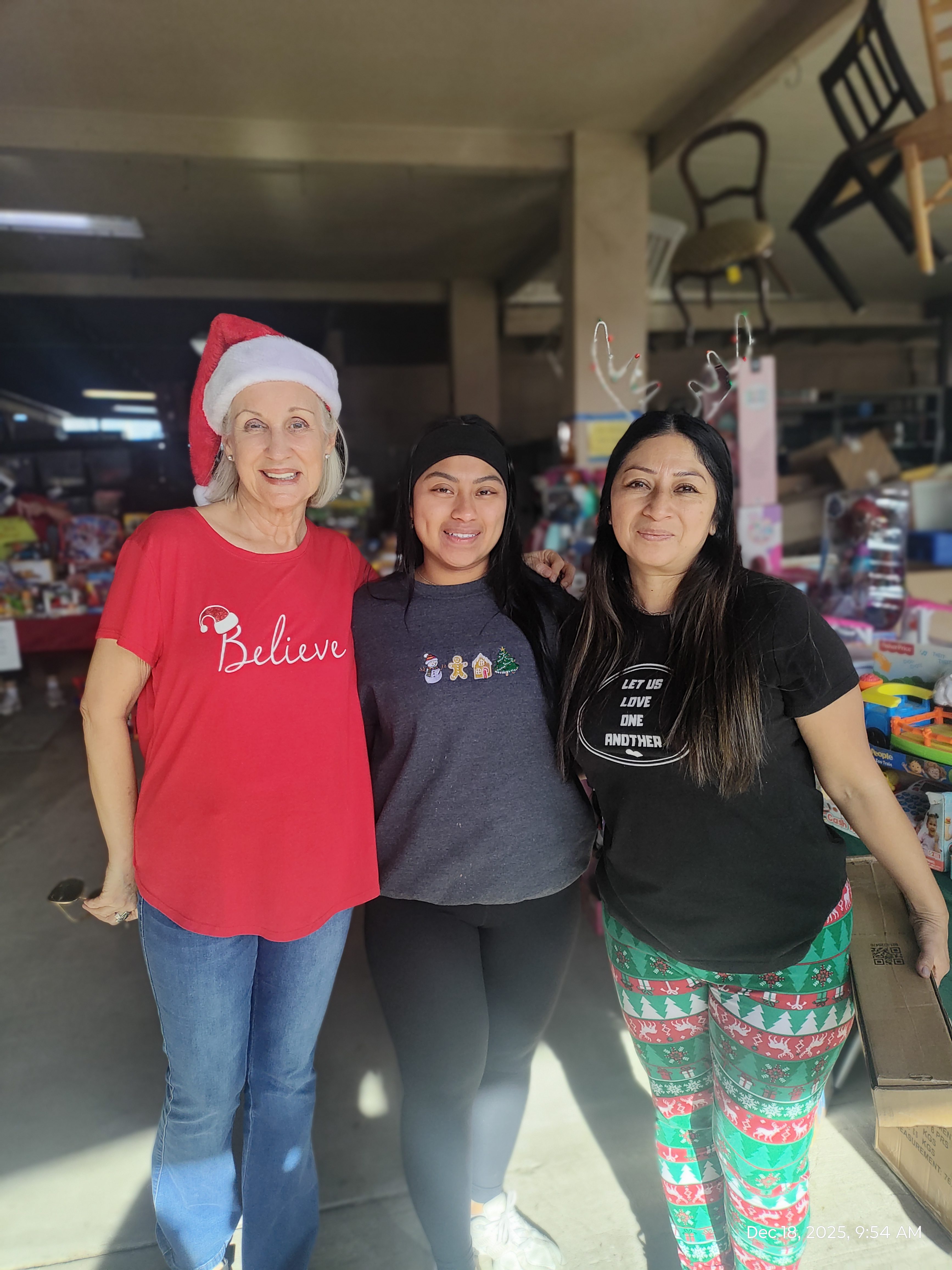 Dana James, Casey Martinez and Perla Martinez at the Dec....