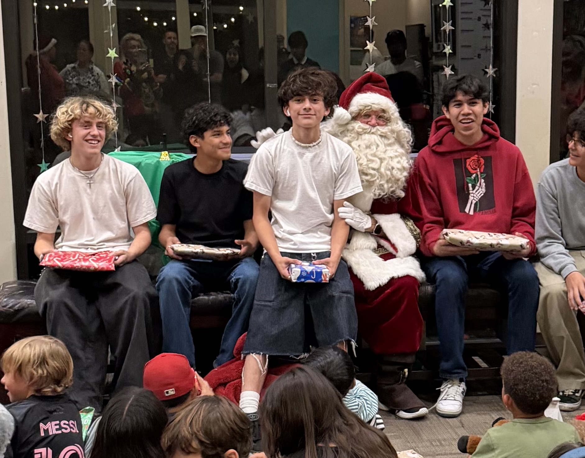 Youth with Santa (Photos by Taylor Miller and RSF Rotarians)