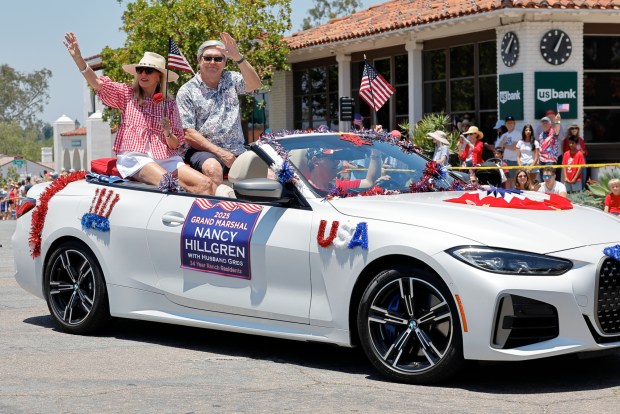 Parade Grand Marshal Nancy Hillgren and her husband Greg(Jon Clark)