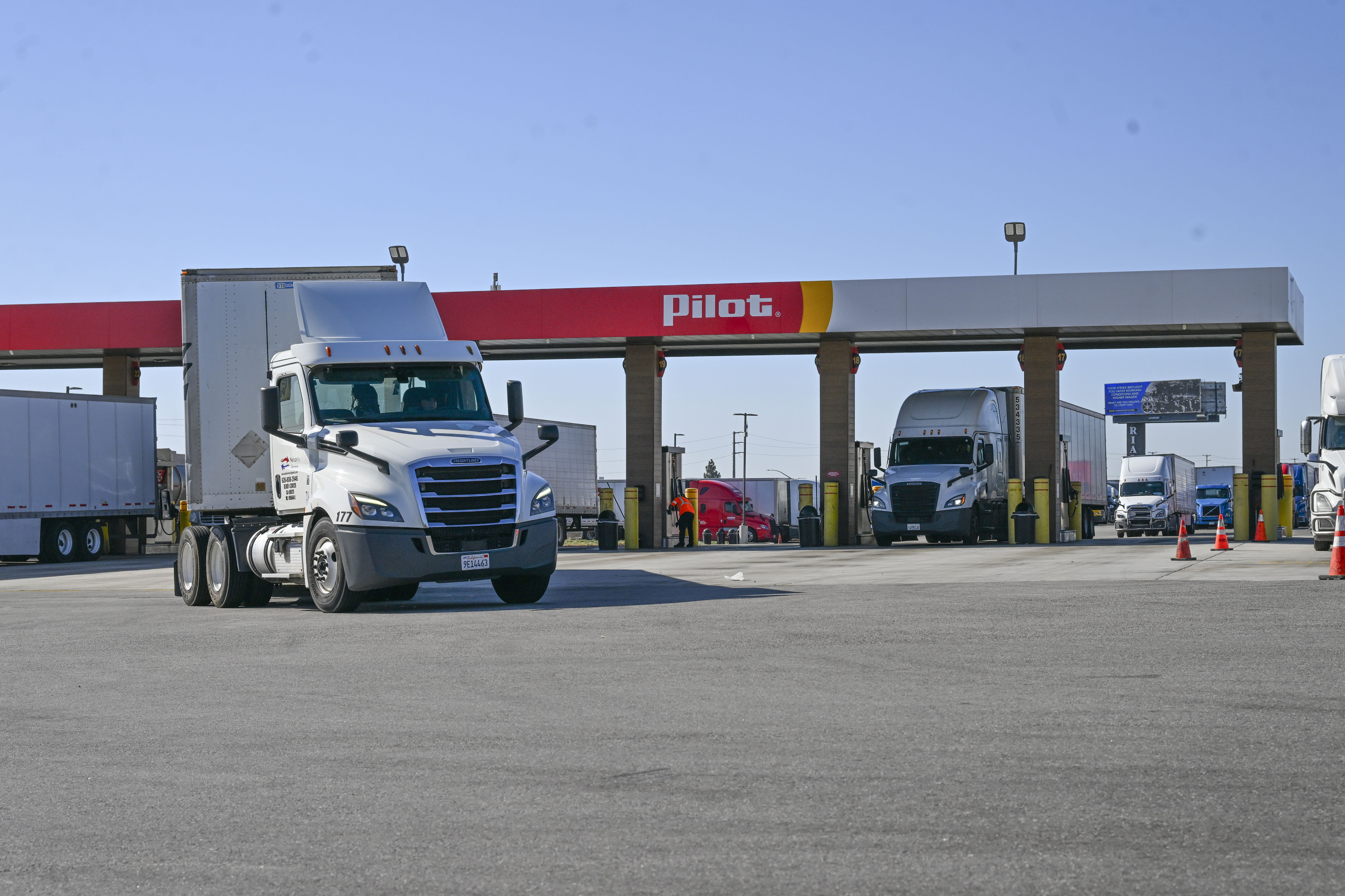 Trucks pull in and out of the Pilot Travel Center...