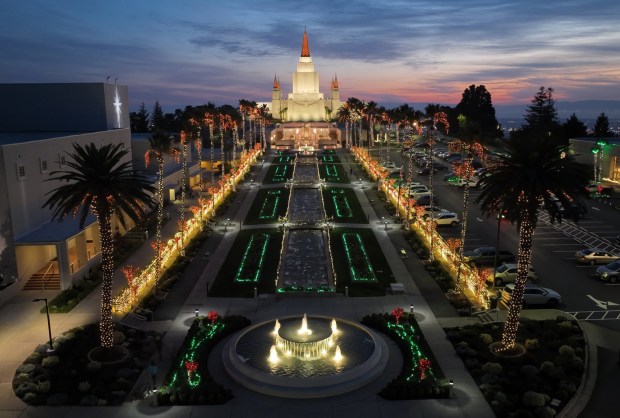 A sunset drone view of the Oakland California Temple holiday lights in Oakland, Calif., on Wednesday, Dec. 11, 2024. (Jane Tyska/Bay Area News Group)