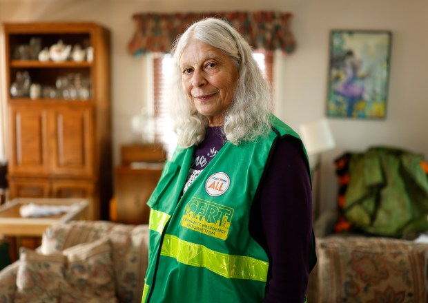 Laila Hinkle poses for a photograph in her home in Belmont, Calif., on Monday, Dec. 18, 2025. Hinkle is a Community Emergency Response Teams Training (CERT) volunteer. (Nhat V. Meyer/Bay Area News Group)