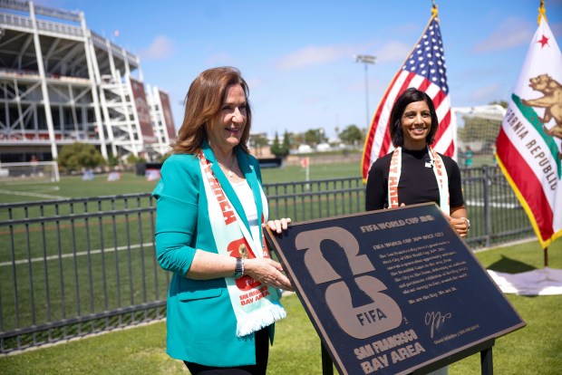 Lisa M. Gillmor, mayor of Santa Clara, left, and Zaileen Janmohamed, President and CEO of the Bay Area Host Committee, stand with a plaque in honor of FIFA at the Santa Clara Youth Soccer Park in Santa Clara, Calif., Wednesday, June 11, 2025. (Shae Hammond/Bay Area News Group)