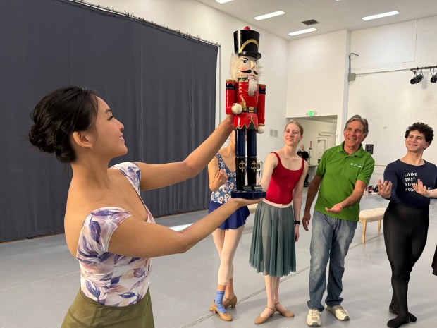 Former San Jose City Councilmember Carl Salas, in green, rehearses with dancers from New Ballet San Jose for "The San Jose Nutcracker." Salas will perform as a guest with the company at its Dec. 13, 2025 performance at the California Theatre. (Courtesy New Ballet San Jose)
