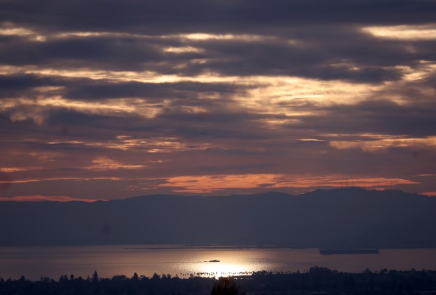 A view of the peninsula as the sun sets on a hazy afternoon in Oakland, Calif., on Tuesday, Dec. 30, 2025. (Jane Tyska/Bay Area News Group)