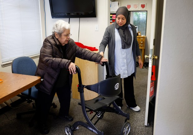 Lidia Donez, left, chats with Alma Soto, Executive Director of Heart of the Valley, in their office in Santa Clara, Calif., on Wednesday, Oct. 15, 2025. Wish Book for Heart of the Valley Services for Seniors. (Nhat V. Meyer/Bay Area News Group)