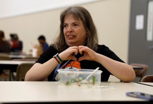 Student Mindy Burger, who teaches a student run ASL class, demonstrates signing at the Independence Network in Santa Clara, Calif., on Friday, Oct. 10, 2025. Wish Book for the Independence Network. (Nhat V. Meyer/Bay Area News Group)
