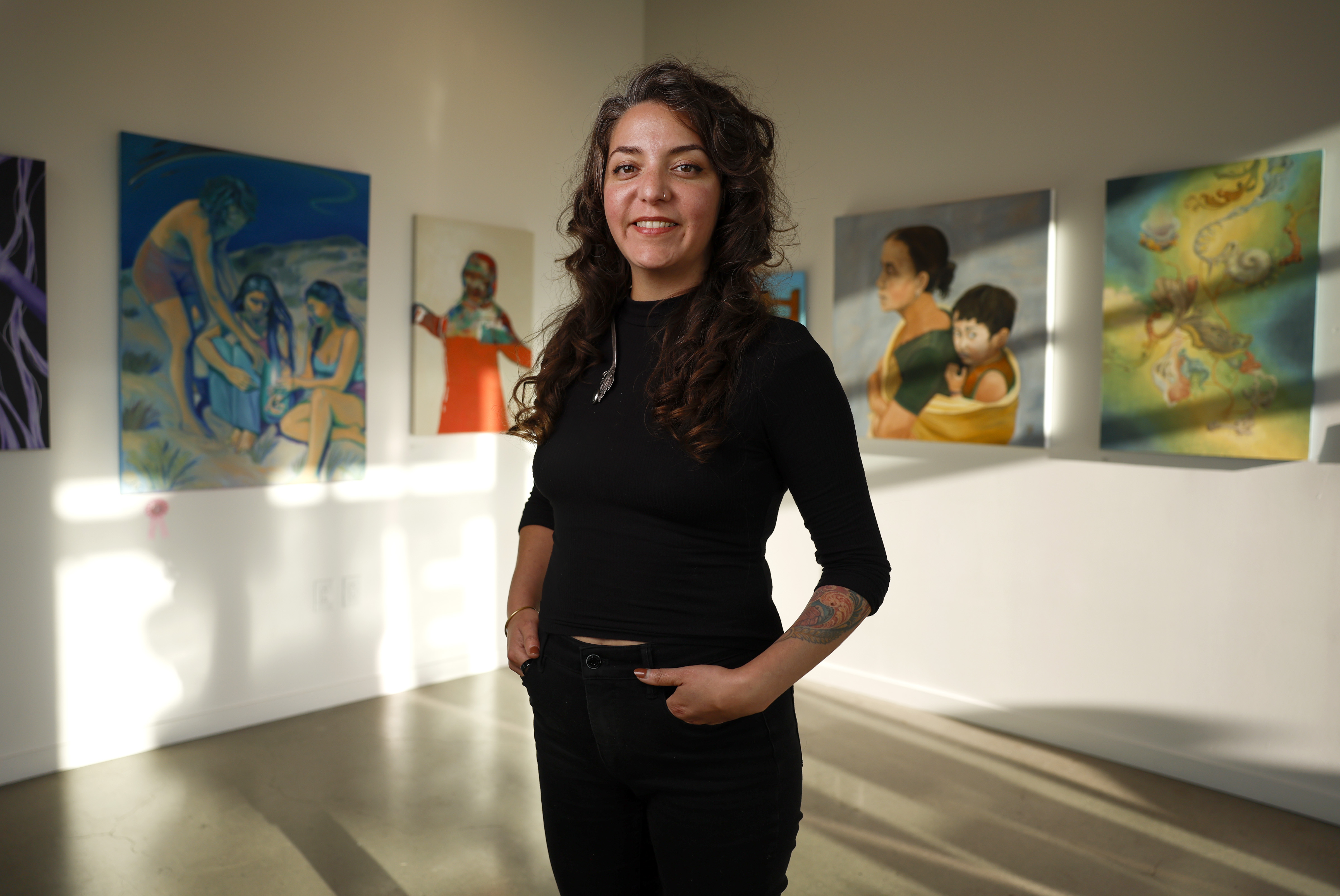 Local Color executive director Erin Salazar poses for a photograph...