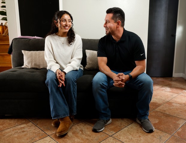 Destinee Coronado, 17, and her father Jovani Villanueva are interviewed at their home in San Jose, Calif., on Thursday, Oct. 2, 2025. At just 10 years old, Coronado was diagnosed with stage 3 ovarian cancer. Wish Book for Coronado with Shop With a Cop Silicon Valley. (Nhat V. Meyer/Bay Area News Group)