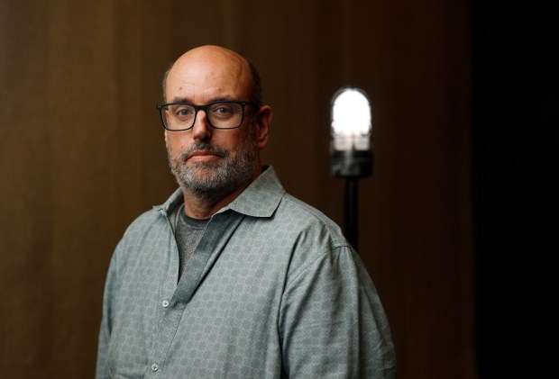 Christopher Ashley, who has served as artistic director of La Jolla Playhouse for 18 years, is stepping down, shown here at the Mandell Weiss Theatre on December 1, 2025 in San Diego, CA. (K.C. Alfred / The San Diego Union-Tribune)