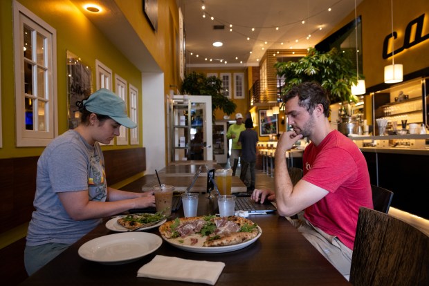 People dine at Caffe Calabria on Thursday, Aug. 7, 2025 in San Diego, CA. (Ana Ramirez / The San Diego Union-Tribune)