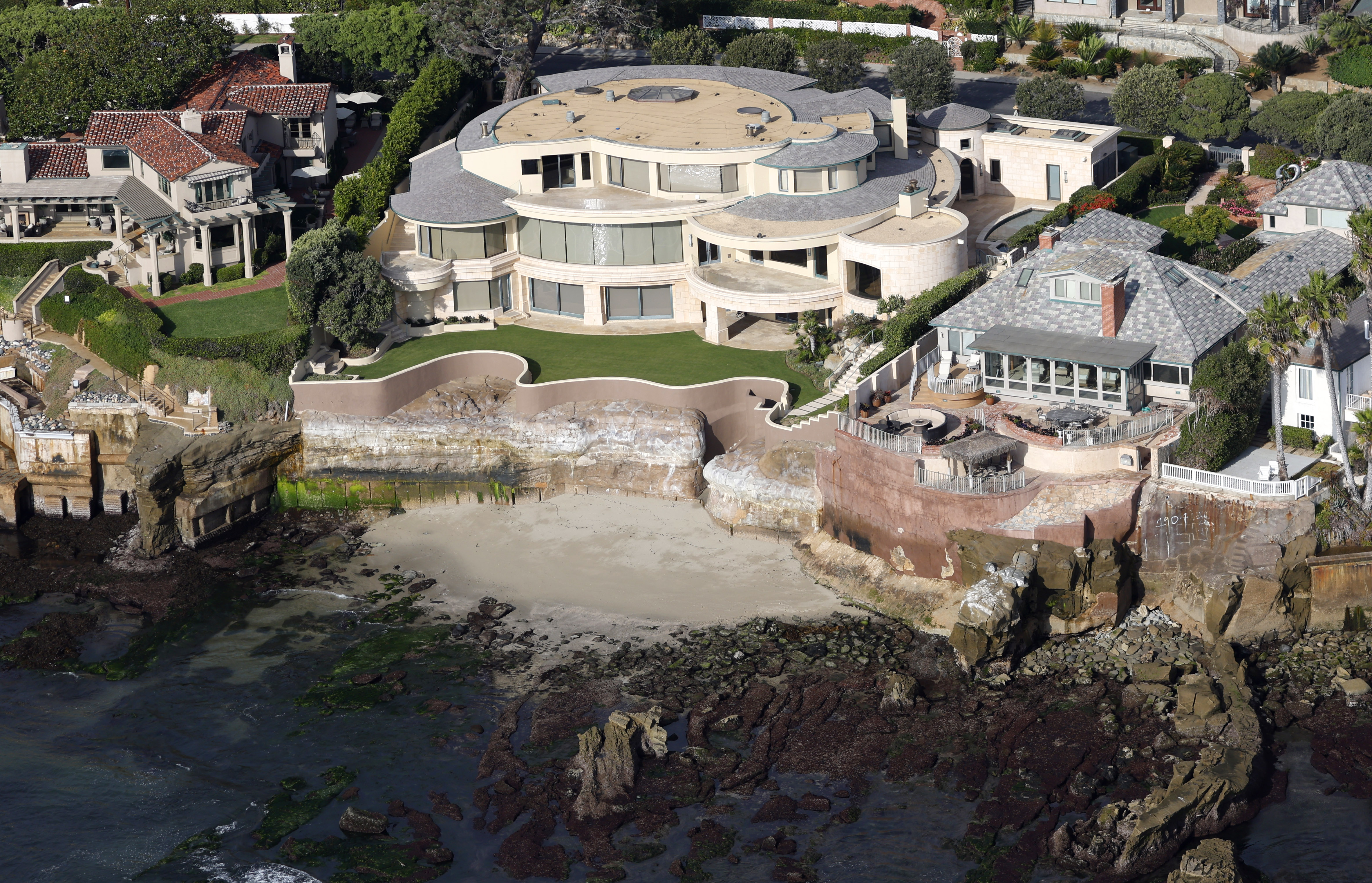 In an early October photo, an oceanfront home on Camino...
