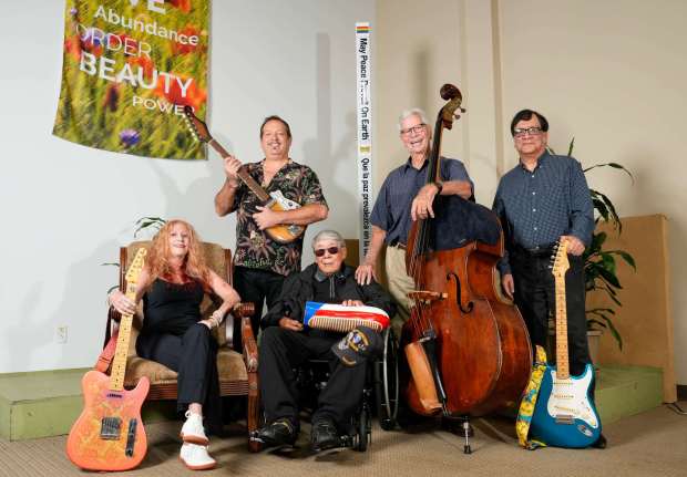 The 2025 San Diego Music Hall of Fame honorees include, seated, Doriot Lair and Eulogio "The Soul Man" Fos, and, standing, John Reis, Bob Magnusson and Bart Mendoza. pose for photo at VISION: A Center For Spiritual Living in Grantville on Tuesday, Sept. 2, 2025 in San Diego, California. (Alejandro Tamayo / The San Diego Union-Tribune)