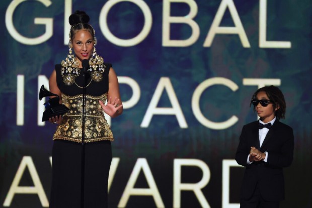 Alicia Keys accepts the Dr. Dre Global Impact Award with her son, Genesis Ali Dean, at the 67th Annual Grammy Awards in Los Angeles on Feb. 2, 2025. (Kevin Winter/Getty Images for The Recording Academy)