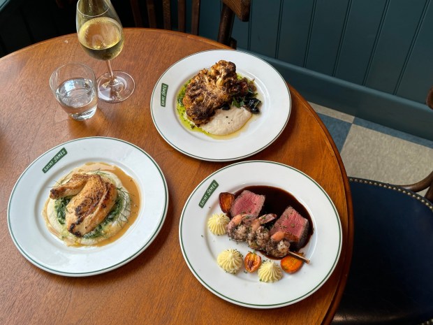 Saint James French Diner's New Year's Eve menu includes a half roasted harissa-crusted cauliflower, marinated shrimp and a filet, roasted chicken and seared scallops with risotto. (Palisociety)