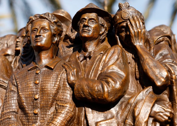 San Diego, CA - December 18: The new "Angels Unawares" sculpture by artist Timothy Schmalz was unveiled in front of the Joan B. Kroc School of Peace Studies at the University of San Diego on December 18, 2025 in San Diego, CA. (K.C. Alfred / The San Diego Union-Tribune)