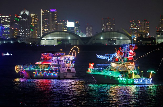 Decorated boats participate in the 54th Annual San Diego Bay Parade of Lights on Sunday Dec. 15, 2024. (K.C. Alfred / The San Diego Union-Tribune)