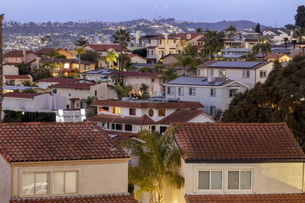With Mt. Soledad in the background, a neighborhood of homes is seen from above Clairemont Drive in February 2023. (Hayne Palmour IV / For The San Diego Union-Tribune)