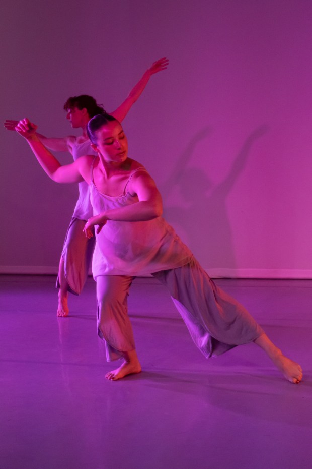 Cecily Holcombe with Lauren Lee perform in San Diego Dance Theater's "Resilient Skies," presented in June at San Diego City College. (Ariana Durazo)
