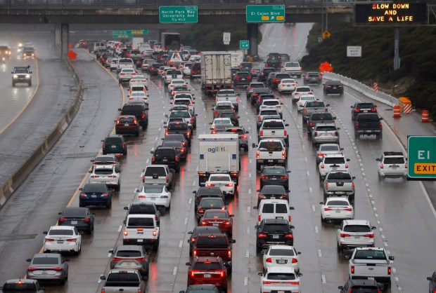 San Diego, CA - December 24: Traffic backs up on southbound I-805 in Normal Heights after after a series of accidents during a storm on December 24, 2025 in San Diego, CA. (K.C. Alfred / The San Diego Union-Tribune)