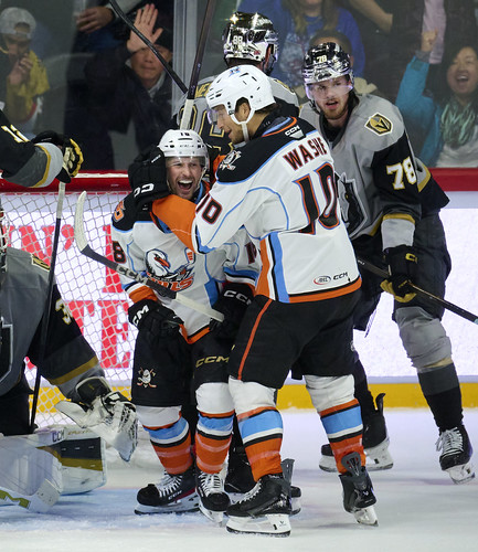 The San Diego Gulls' Judd Caulfield, left, celebrates with teammate Tim Washe during this month's home game against the Henderson Silver Knights. (Andy Hayt, San Diego Gulls)