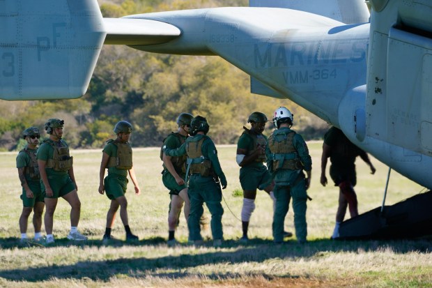 At Camp Pendleton, Navy medical personnel respond to a simulated attack by multiple drones that struck while troops were having chow at their forward base.  The wounded are immediately taken to a field medical unit comprised of medical personnel from the U.S. Navy, where they are treated and stabilized before being airlifted to a hospital. (Nelvin C. Cepeda / The San Diego Union-Tribune)