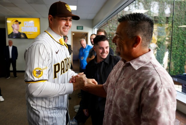 San Diego Padres new manager Craig Stammen greets pitching coach Ruben Niebla after a news conference at Petco Park on Nov. 10, 2025 in San Diego, California. (Photo by K.C. Alfred / The San Diego Union-Tribune)